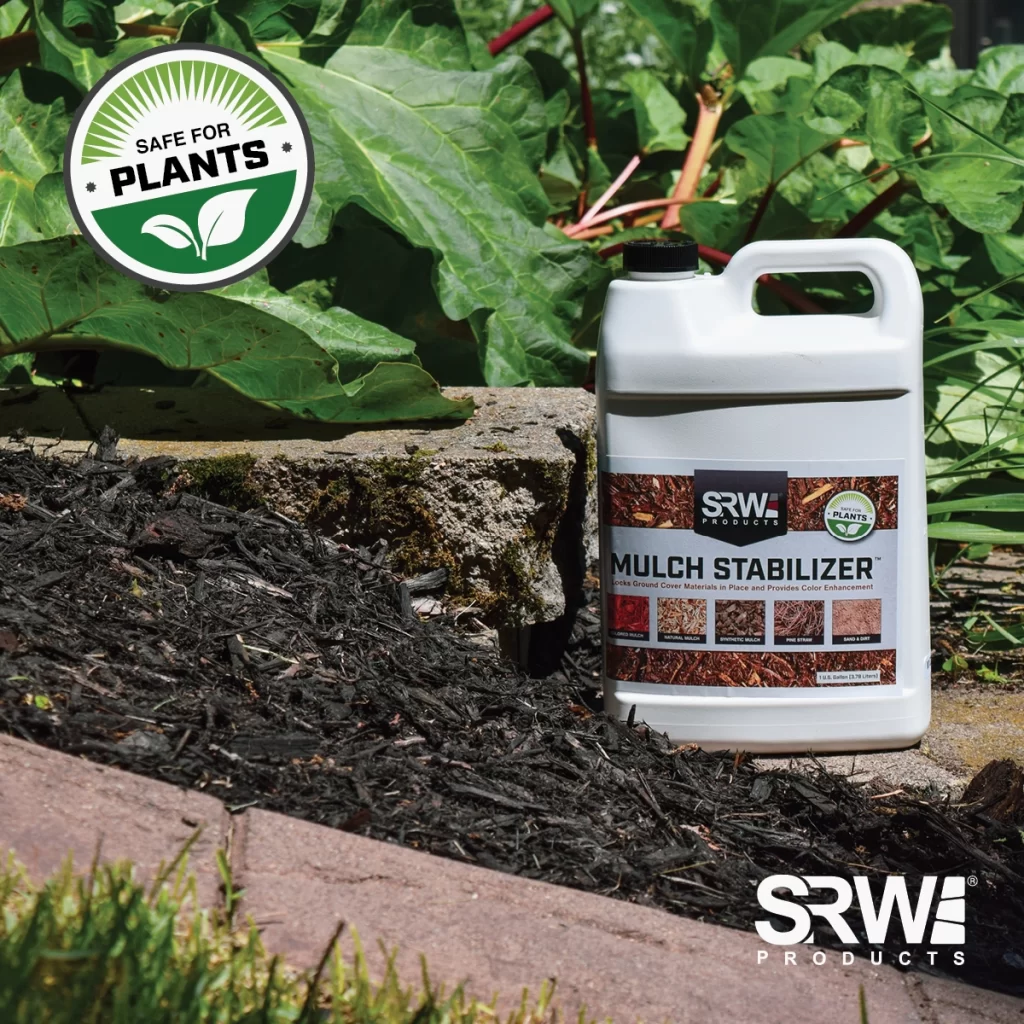 Mulch Stabilizer product container image on a mulched surface surrounded with vegetation